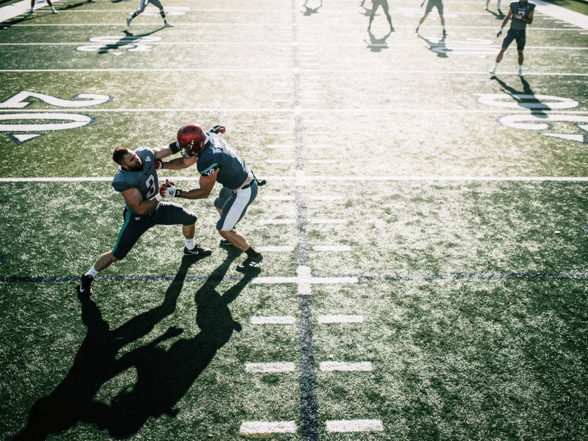 Khamzat Chimaev in the UFC octagon showcasing his welterweight grappling and striking technique