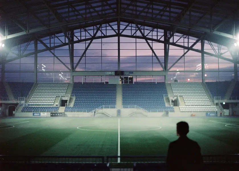Max Holloway holding the UFC BMF title belt at a press conference before his next fight