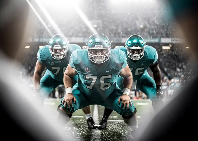 Tottenham Hotspur badge overlaid on Premier League Table Standings graphic showing relegation zone danger