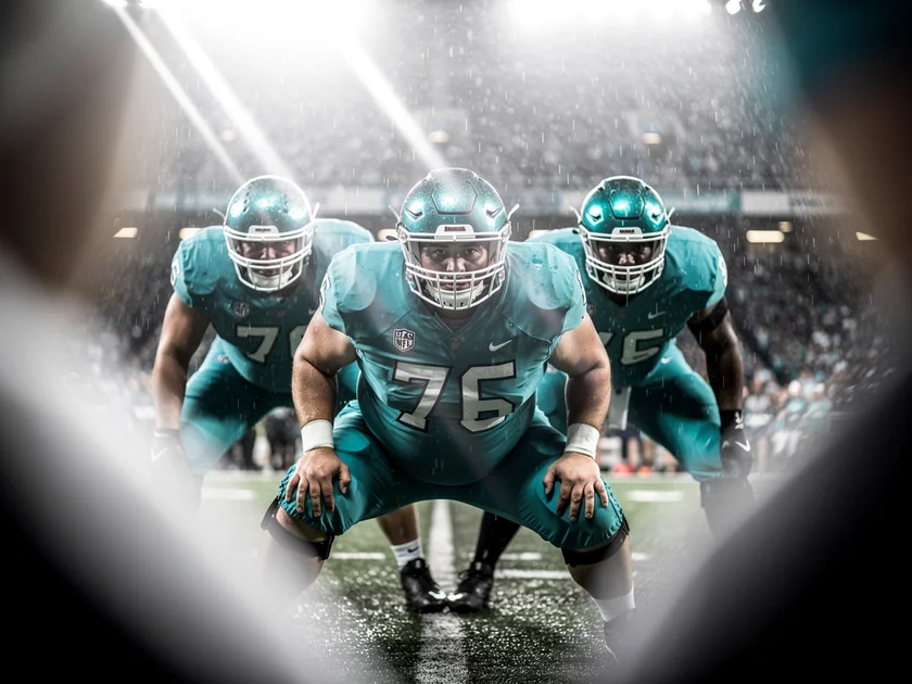 Tottenham Hotspur badge overlaid on Premier League Table Standings graphic showing relegation zone danger