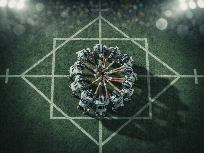 Arsenal players celebrating amid Premier League Title Race tension at the Emirates Stadium in 2026