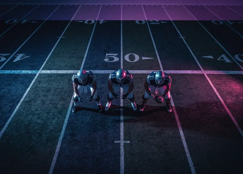 Arsenal and Manchester City players competing in the 2026 Premier League Title Race at the Etihad