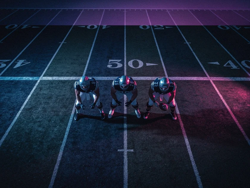 Arsenal and Manchester City players competing in the 2026 Premier League Title Race at the Etihad